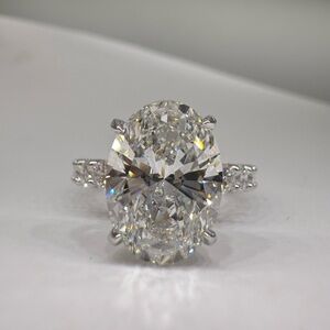 4.76 carat E VS1 oval lab diamond on full eternity round diamond engagement ring